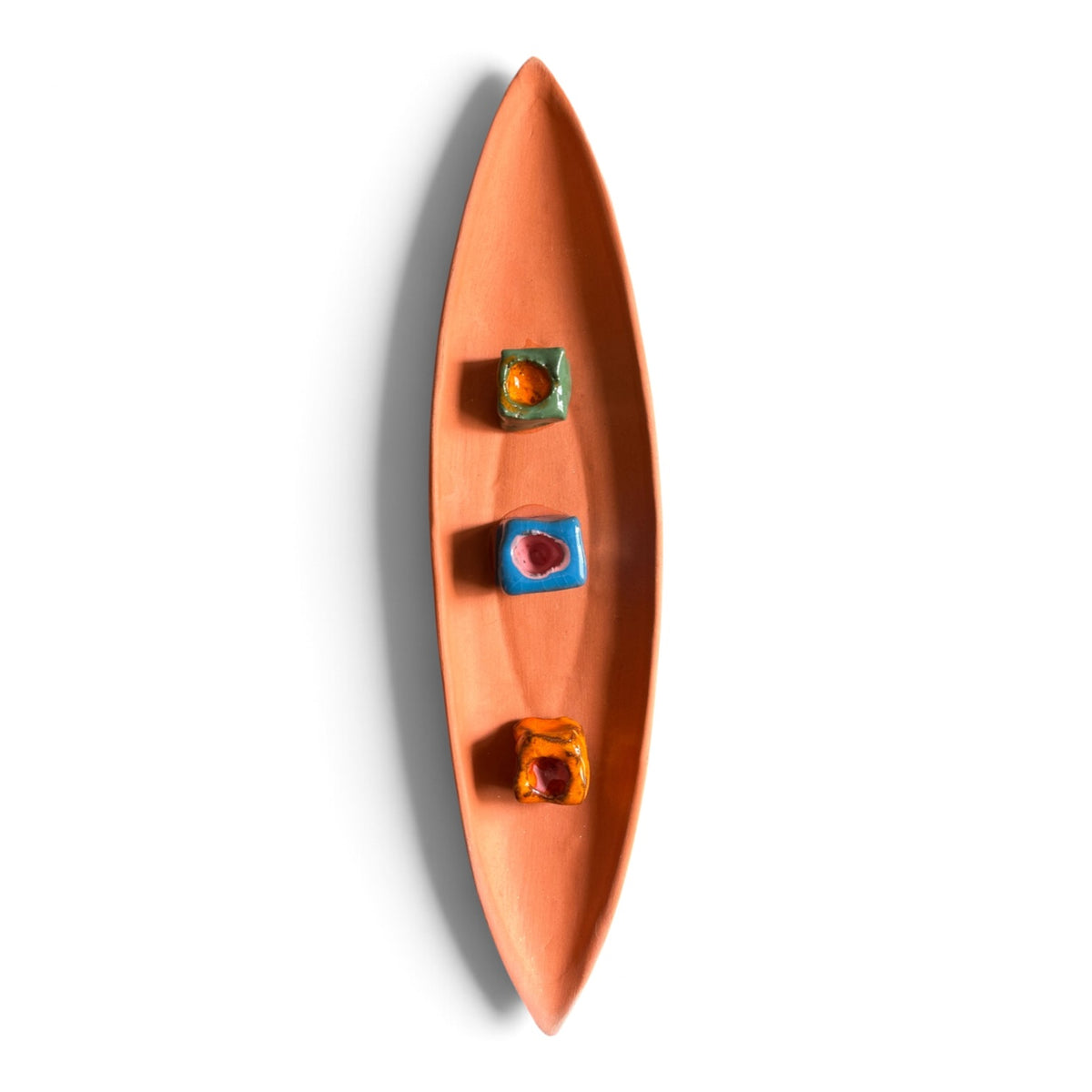 Escultura canoa em cerâmica