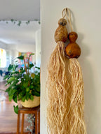 Dupla de cabaças redondas com linho de Buriti