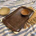 Bandeja esculpida em estipe de palmeira