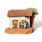 Casinha branca em miniatura com brincadeira de passar anel - Claudio Henrique